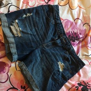 Distressed dark wash jean shorts